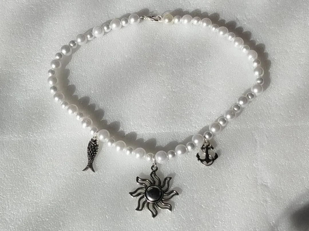 Collar con dijes
